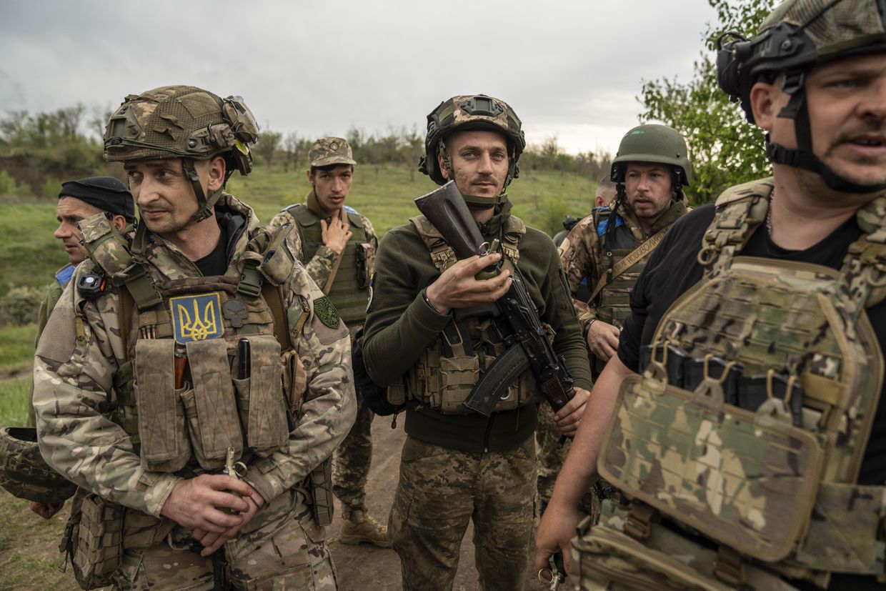 Ukrainian infantrymen from the 68th Brigade undergo training in tactical combat medicine in Donetsk Oblast, Ukraine, in May 2025