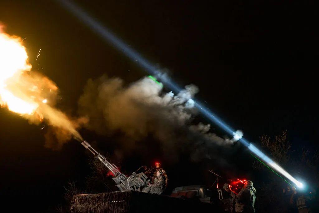 Illustrative image: Ukrainian soldiers from a Mobile Air Defense Fire Team shoot down Russian drones at an undisclosed location in Ukraine using guns.