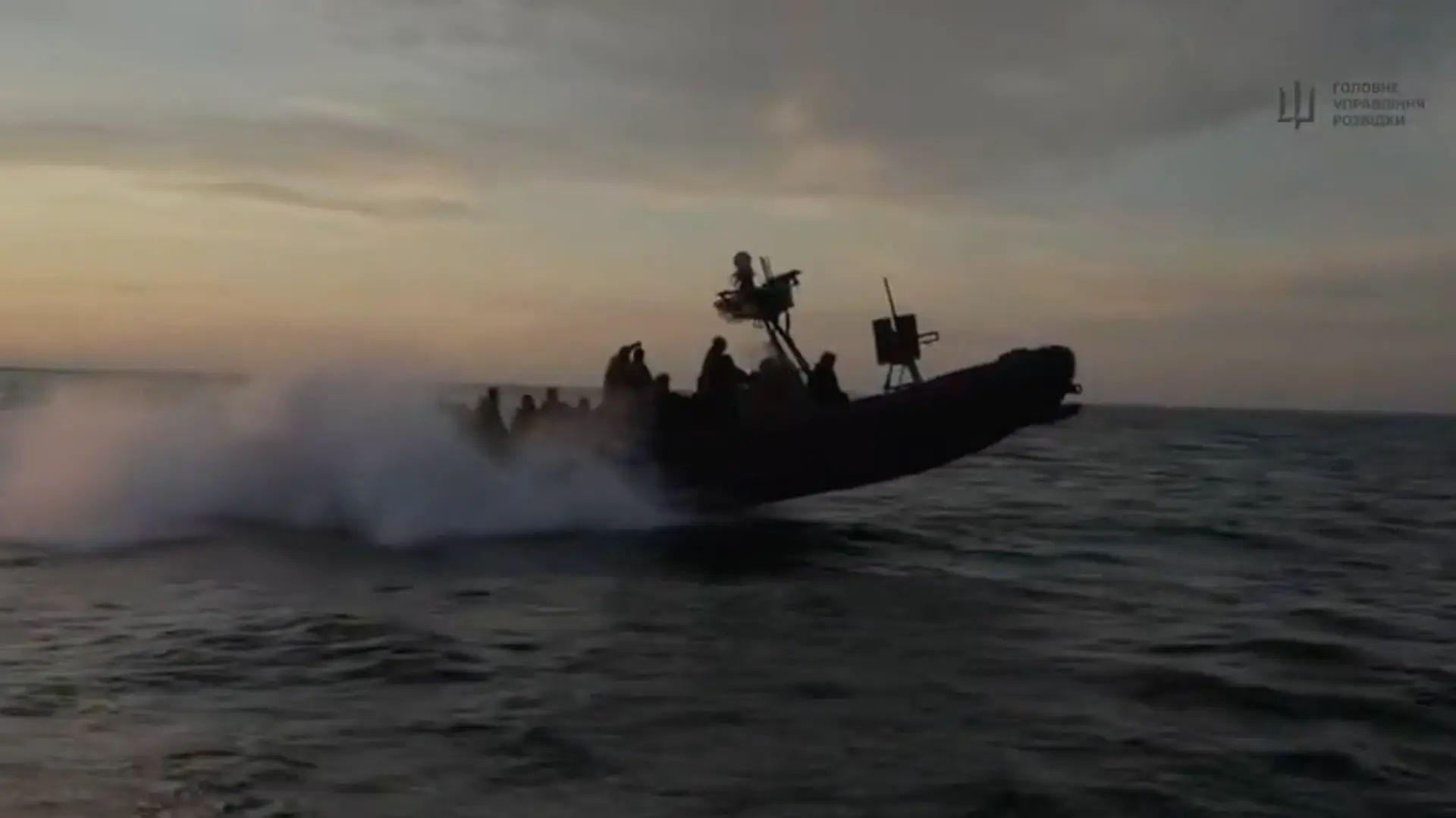 A boat carries Ukrainian special forces conducting a raid on the Russian-occupied Tendra Spit in the Black Sea on July 28, 2025