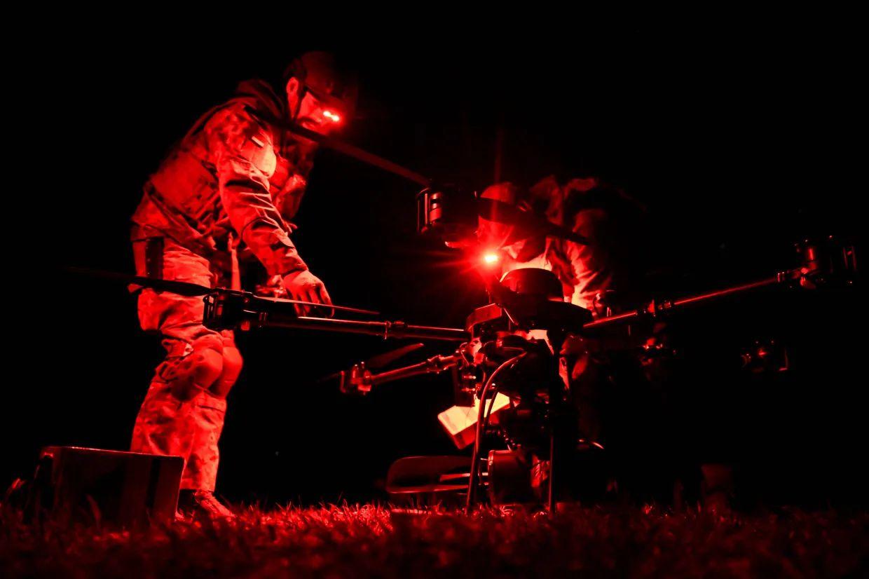 Soldiers of a drone platoon from the 110th Territorial Defence Brigade launch a Vampire heavy bomber drone in Zaporizhzhia Oblast, Ukraine