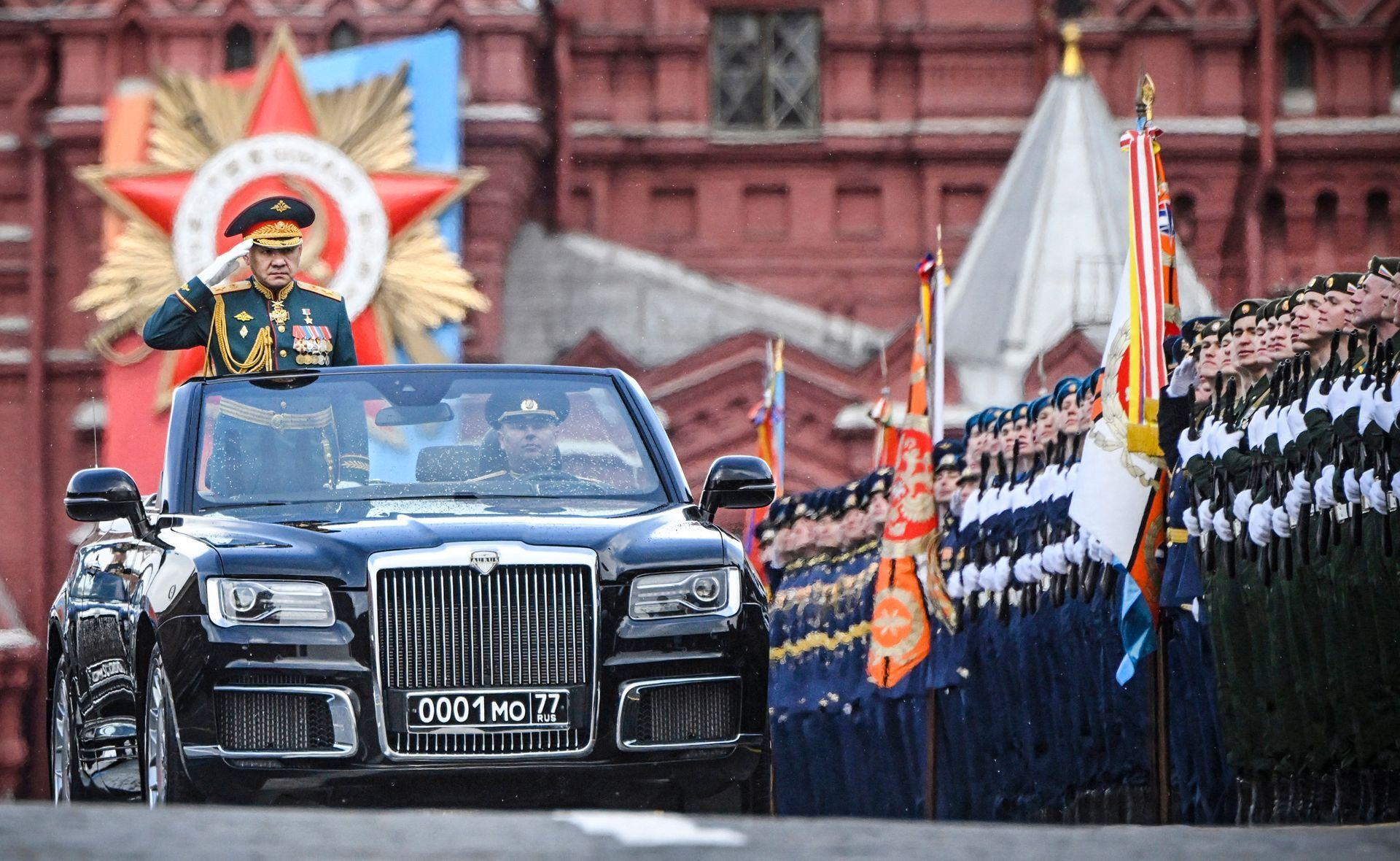 Then-Russian Defense Minister Sergei Shoigu salutes soldiers as he is driven along Red Square during the military parade in Moscow, Russia, 2024